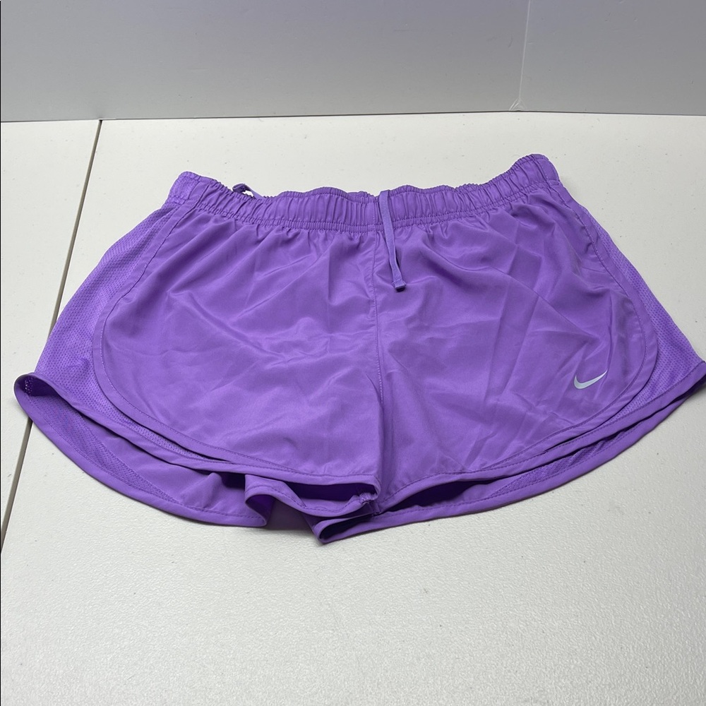 Nike Women's Athletic Shorts in Vibrant Purple. Size M